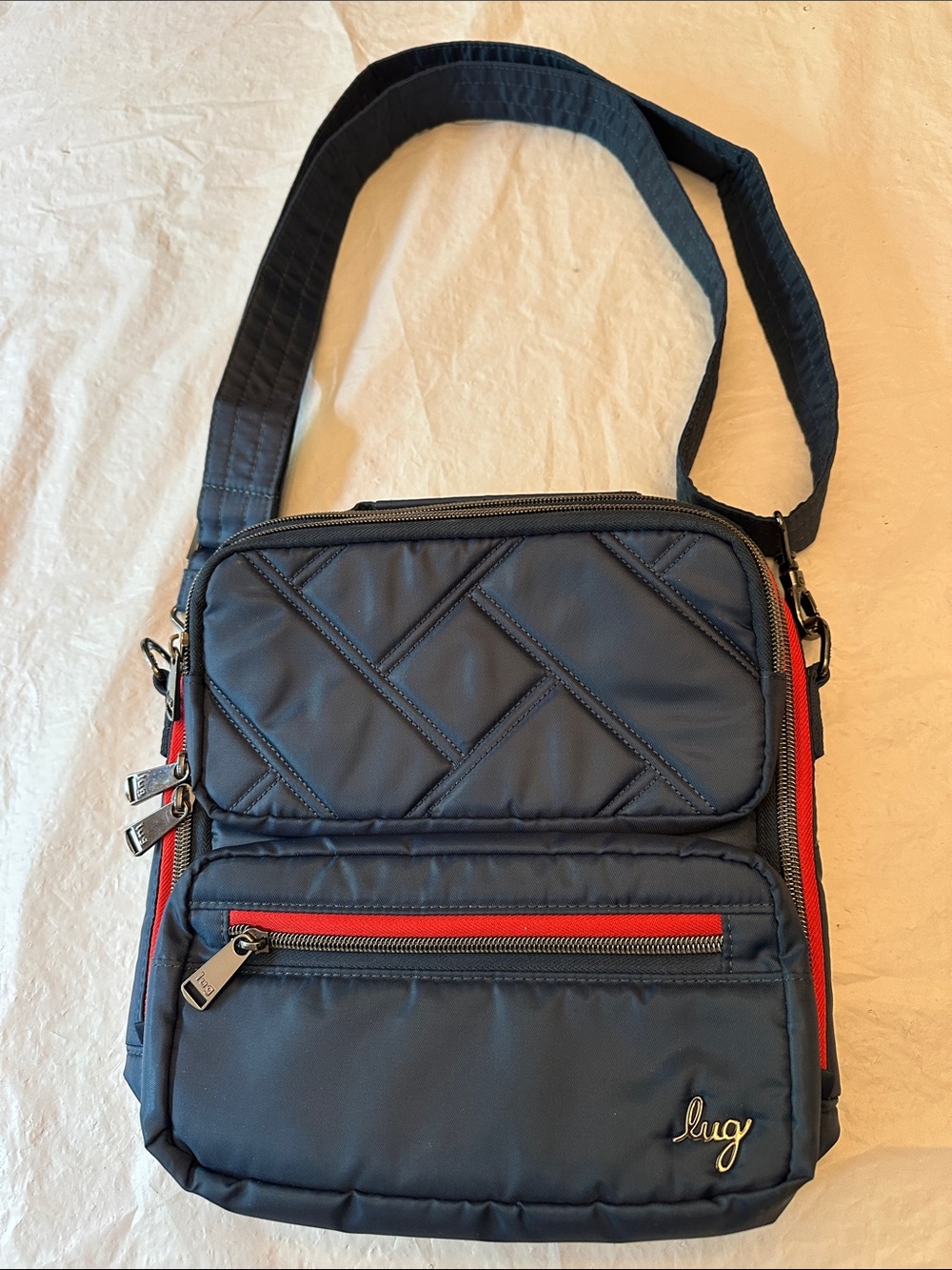 lug Navy Crossbody Messenger Bag with Red Zippers